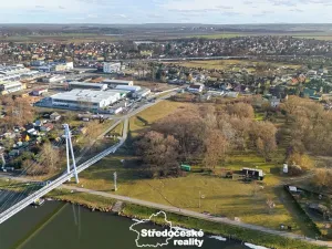 Prodej podílu komerčního pozemku, Čelákovice, 13487 m2