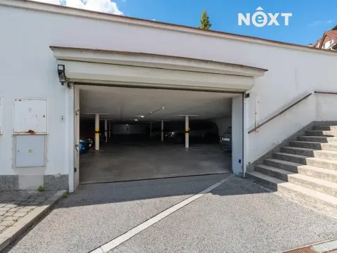 Prodej podílu garážového stání, Brno, Högrova, 11 m2